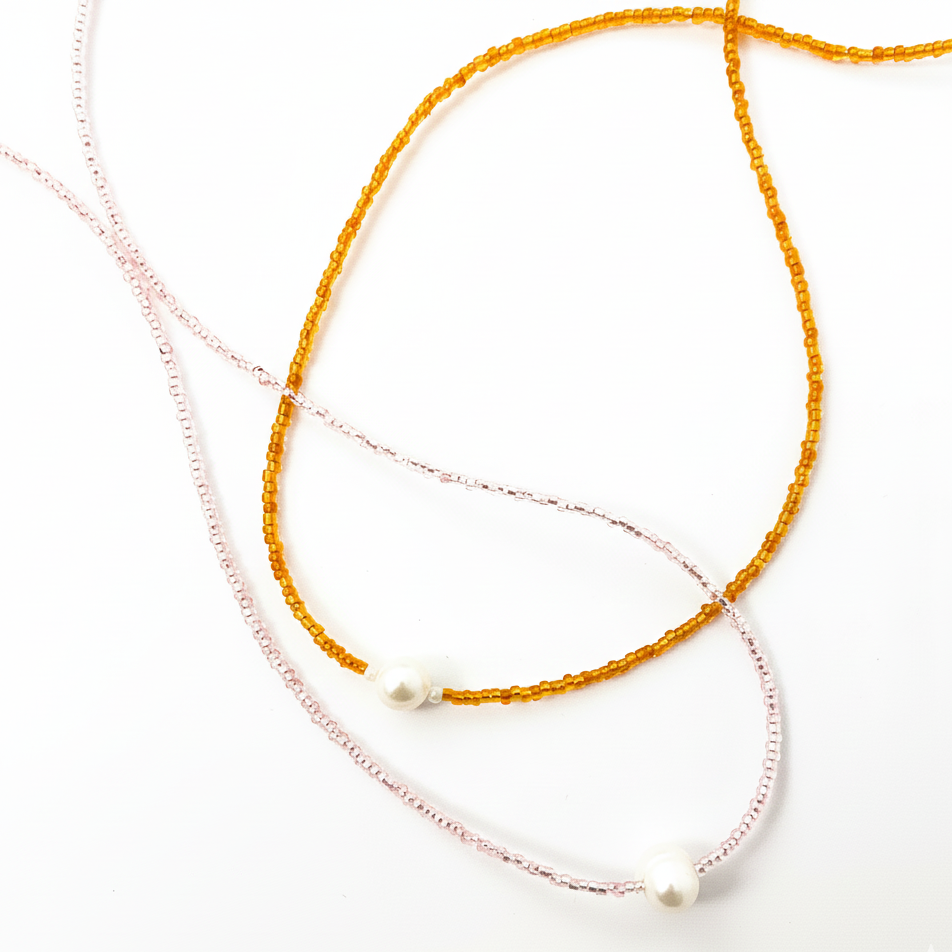 COLLAR PERLA CON CHAQUIRA SAGITARIA