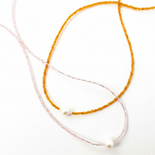 COLLAR PERLA CON CHAQUIRA SAGITARIA